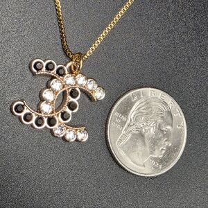 CHANEL Double C Pendant Necklace with black and clear Stones. 18k PVD SS Chain.